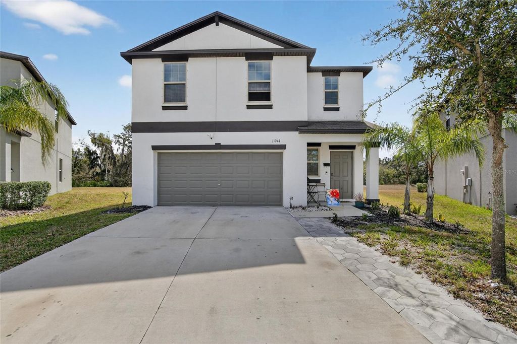 Photo of 11944 Miracle Mile Drive, Riverview, FL 33578 (MLS # TB8477477)