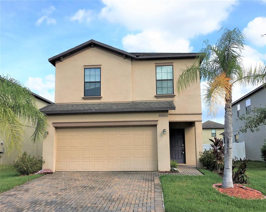 Discover your dream home in the heart of New Tampa's Live Oak Preserve community. This spacious 4-bedroom, 2.5-bathroom gem boasts a luxurious primary suite complete with a dual sink, garden tub, a stand-alone shower, and a walk-in closet. Upon entering you are greeted by tile flooring throughout the first floor, adding an elegant touch to your living space. The home features all bedrooms upstairs, ensuring privacy and tranquility. With a 2-car garage and washer/dryer included, this residence offers both comfort and practicality. Enjoy the vibrant community of Live Oak Preserve, spanning 1300 acres across New Tampa, with 362 acres of pristine wetlands. Indulge in the resort-style pool, splash zone, fitness center, and multiple tennis courts. Let your children play freely in the well-equipped playground and take leisurely strolls along the community's scenic walking trails. Nestled conveniently near hospitals, excellent schools, shopping malls, and major highways, this home combines luxury and convenience seamlessly. In addition to the advertised base rent, all residents are enrolled in the Resident Benefits Package (RBP) for $50.00/month which includes HVAC air filter delivery, credit building to help boost your credit score with timely rent payments, utility concierge service making utility connection a breeze during your move-in, and much more! More details upon application. Vacant/Available 12/06/2023