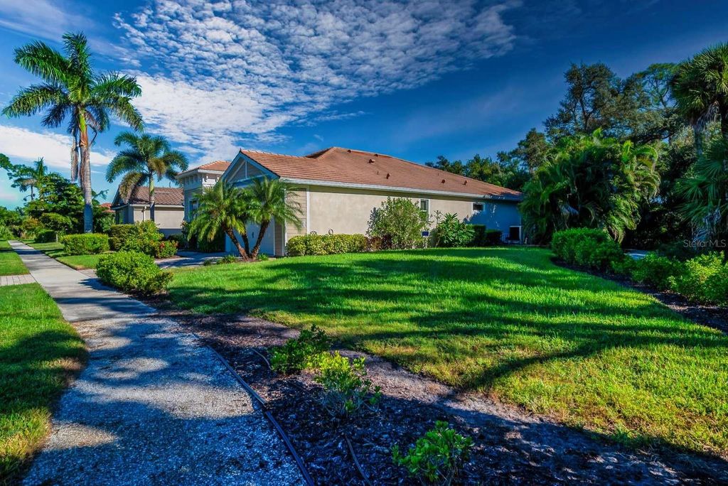Photo of 11539 Tapestry Lane, Venice, FL 34293 (MLS # TB8452374)