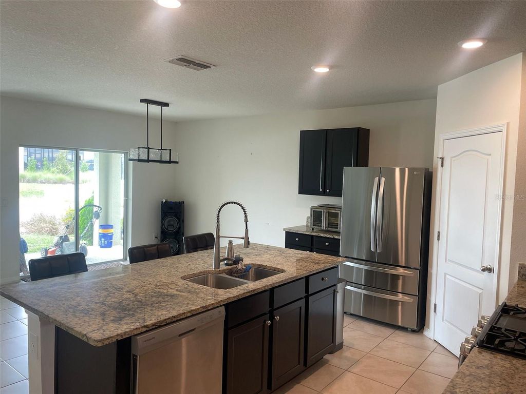 Photo of 2352 White Poppy Drive, Kissimmee, FL 34747 (MLS # S5134364)