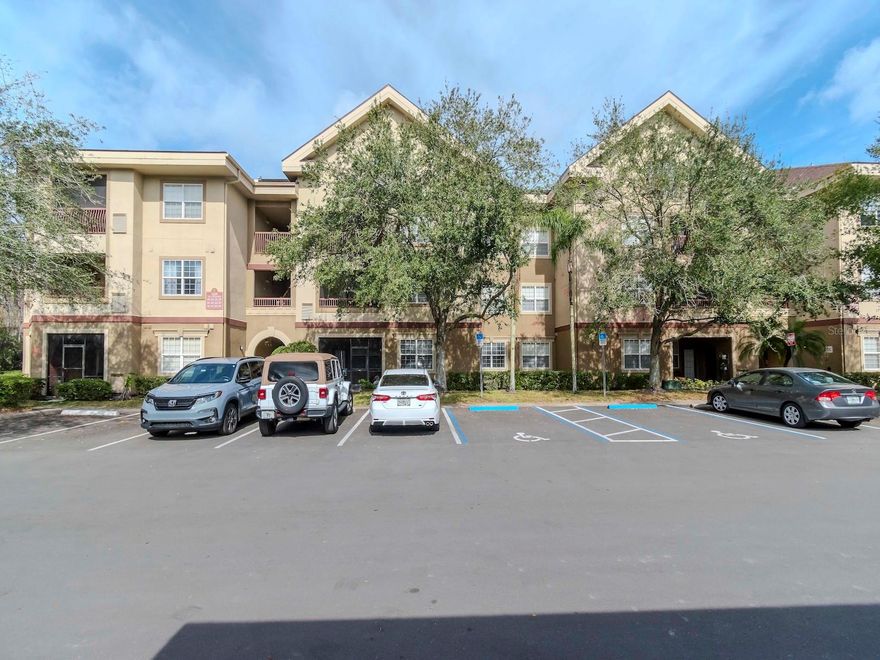 One or more photo(s) has been virtually staged. Welcome to the lovely Toscano condominiums at Suncoast Crossings. Recently painted, this spacious unit is light, bright and ready for you to make your own. All three of the bedrooms are generously sized with plenty of closet space. The floors boast newer luxury vinyl flooring and are in all living areas and bedrooms. Due to the open floor plan, the kitchen and bar area are ideal for family meals or entertaining friends and family. The oversized family room easily accommodates the largest furniture pieces. There is a cozy balcony for enjoying a morning coffee or perhaps a nighttime glass of wine. Looking for extra storage, two additional outdoor storage closets are available just off the balcony. The units just received new roofs in 2021 and are scheduled for exterior paint within the next six months. For those interested in staying in shape, they have a wonderful fitness center as well as a huge inviting swimming pool. Want to host a party, check out the clubhouse and all it has to offer. There are several different rooms including a room with a pool table, so entertaining or hosting meetings will never be an issue. The fitness center is also inside the clubhouse. Once you have worked out, cool off in the enormous high-end swimming pool. Additional features include daily trash pickup in your personal bin, right outside your front door.