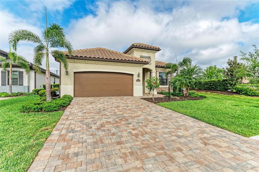 Repositioned to reflect today’s market – now an even greater value! Lowest price per square foot of all single-family homes in Lakewood National Golf Club, this is a new opportunity to acquire this exceptional residence at revised pricing. If you are seeking a dynamic yet refined lifestyle, look no further. This spacious single-family deeded golf home is on a great homesite with golf course views and walking distance to all of the amazing amenities offered in this coveted community.  Offering four bedrooms, two baths with 2,248 interior square feet providing easy, relaxing and maintenance-free living in the gated community of Lakewood National Golf Club. The Isabella floor plan showcases an open-concept design with a split-bedroom layout, providing privacy and flow. Interior highlights include custom paint, crown molding, Hunter Douglas blackout blinds and ceiling fans in each bedroom, living room and patio. The kitchen features a natural gas range, built-in wall oven, generous pantry and abundant cabinet storage. The oversized primary suite includes two walk-in closets and plenty of natural light. Enjoy Florida’s indoor-outdoor lifestyle from the screened lanai, complete with an outdoor kitchen and amazing light all day. This pool-ready golf view lot is loaded with opportunity. The two-car garage and proximity to resort-style amenities enhance the home's appeal. All this, plus owners in Lakewood National Golf Club enjoy deeded golf membership giving owners the ability to play 36 holes of championship golf year-round. The Commander course at Lakewood National Golf Club was named No. 1 Golfers’ Choice and No. 1 Top Course in Florida by Golf Advisor. Lakewood National Golf Club offers gated, maintenance-free living with extraordinary amenities that include 36 holes of Arnold Palmer-designed golf courses, a zero-entry heated pool with cascading waterfalls and lap lanes, poolside tiki bar and café, fitness center with group exercise classes, an on-site full-service spa, eight lighted Har-Tru tennis courts, bocce, pickleball, several satellite pools, and a stunning 28,000-square-foot clubhouse which offers fine and casual dining, an expansive bar and lounge, men’s and ladies lounges and locker rooms, conference and meeting space, a full-time lifestyle director who keeps residents’ social life fun and active with trivia night, karaoke night, live concerts on the green, extravagant holiday parties, wine-tasting dinners and more. Lakewood National Golf Club hosts the annual Korn Ferry Tour’s LECOM Suncoast Classic. Incentives if closing before January 2026.