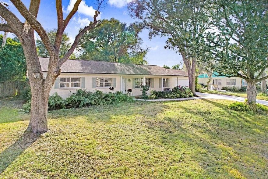 Welcome to this beautifully renovated 3-bedroom, 2-bath home located in the heart of Brandon. Completely move-in ready, this home features fresh interior paint, brand-new flooring throughout, a stunning updated kitchen, and fully remodeled bathrooms.
Step inside to an extra-large living area that feels open, airy, and perfect for both everyday living and entertaining. French doors lead to a screened lanai and expansive backyard, creating seamless indoor-outdoor flow. The remodeled kitchen is a showstopper, featuring crisp white cabinetry, granite countertops, a stylish tile backsplash, and new stainless steel appliances for a clean, modern look. A generous pantry, breakfast bar, and open view to the great room add both function and charm. Enjoy peaceful views from the kitchen sink window overlooking the large, treed 1/3-acre lot, offering plenty of space to add a pool. The backyard is designed for enjoyment, with built-in play features , a separate fenced area for pets, a charming arbor for entertaining, and a screened lanai for additional outdoor living space. Both bathrooms have been updated with fresh paint, new cabinetry, and granite countertops. This home is ideally located just minutes from Brandon Hospital, the Crosstown Expressway, and I-75, providing quick access to shopping, dining, and commuting routes. A rare combination of modern updates, generous outdoor space, and an unbeatable location—this home is a must-see.