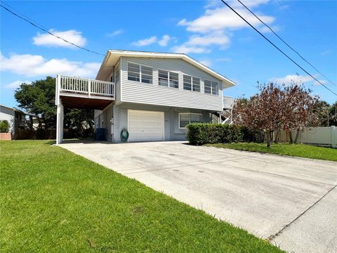 Photo of 824 Garfish Avenue, New Smyrna Beach, FL 32169 (MLS # O6403072)