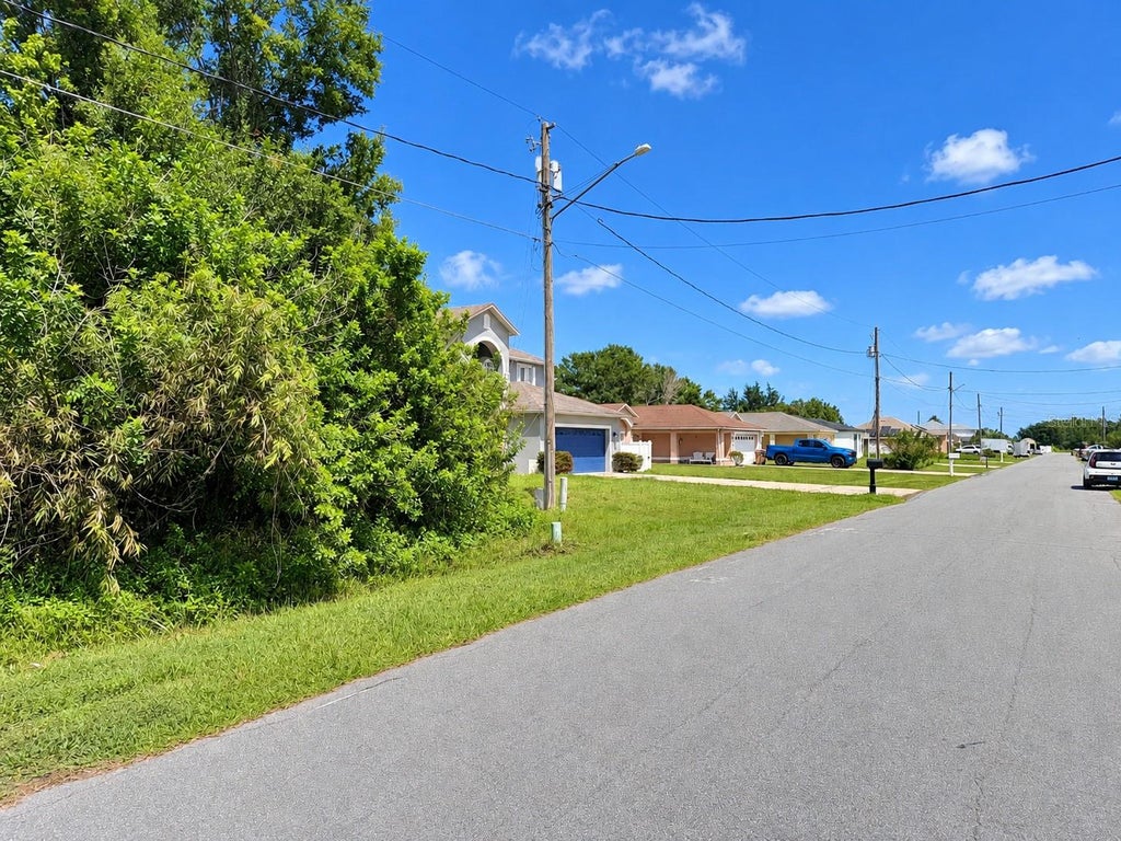 Photo of 1005 Cannes Drive, Kissimmee, FL 34759 (MLS # O6443326)