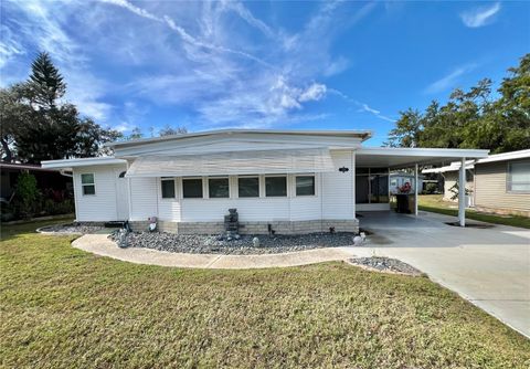 Photo of 136 Aspen Circle, Leesburg, FL 34748 (MLS # G5105814)