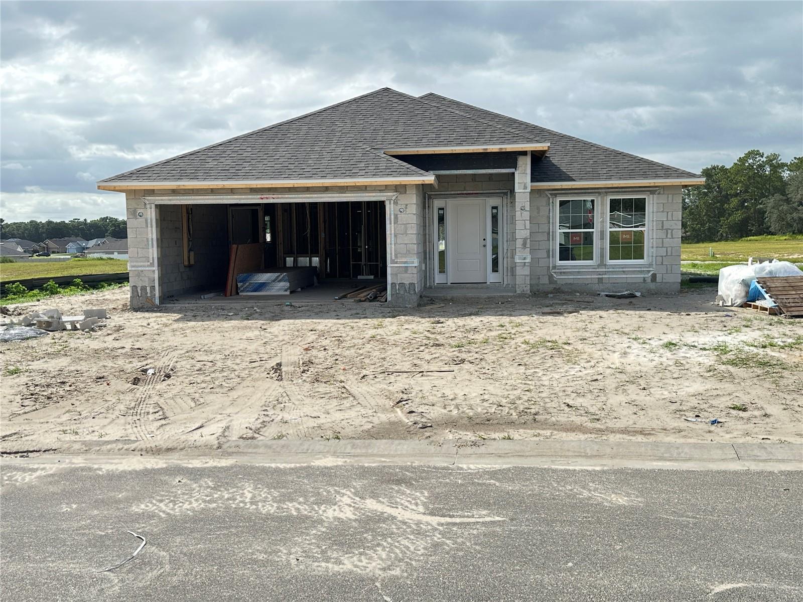 Under contract-accepting backup offers. Under Construction. Brand new CONCRETE BLOCK home under construction! Estimated completion is approx January 2026, pending any setbacks beyond the builders control. Brand new 4 bedroom/3 bath home in the desirable community of Oak Hill Plantation with public water/sewer and LOW HOA fees. Upgrades include: tile in all areas including bedrooms, shaker style cabinets with pull bars, high-definition beveled-edge countertops, separate tile shower with light in primary bath, stainless steel appliances, covered rear porch, and in-wall pest system. Very open floor plan great for entertaining! TAEXX pest control system built in home. At 1mile from shoppings, Restaurants, Appleton Museum of Art, Silver Springs Park and more. Home comes with a 1-year builder warranty and 10-year structural warranty. Renderings for illustrative purposes only. Prices & Promotions are subject to change without notice. Pictures are from similar home with same floor plan. Colors and upgrades may vary. Builder helps with closing costs when Buyer pays cash or closes with a Seller approved lender.