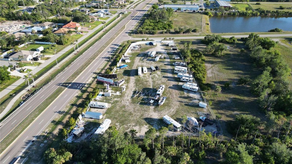 Photo of 8001 Gasparilla Road, Rotonda West, FL 33947 (MLS # C7496935)