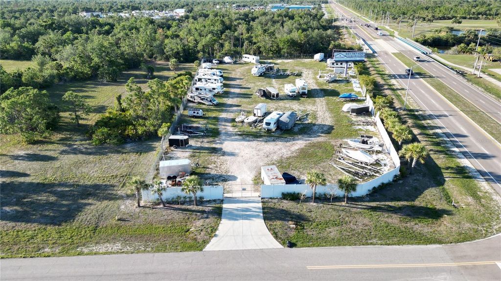 Photo of 8001 Gasparilla Road, Rotonda West, FL 33947 (MLS # C7496935)