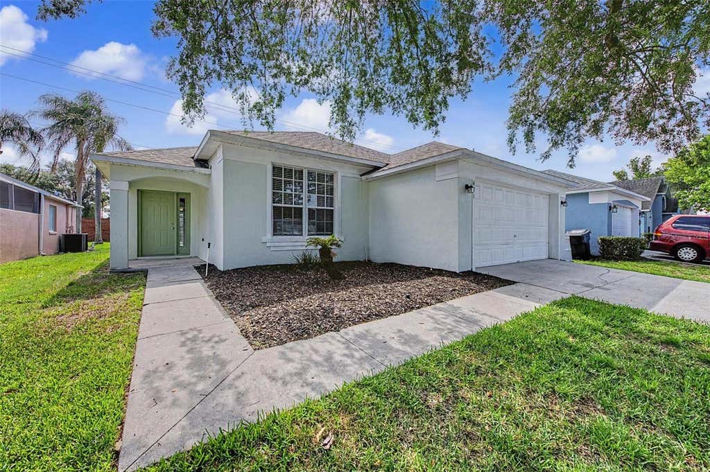 Photo of 421 Holborn Loop, Davenport, FL 33897 (MLS # TB8525413)