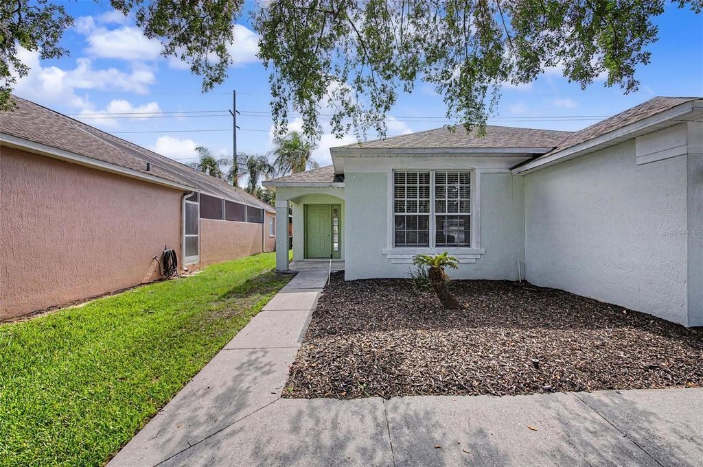 Photo of 421 Holborn Loop, Davenport, FL 33897 (MLS # TB8525413)
