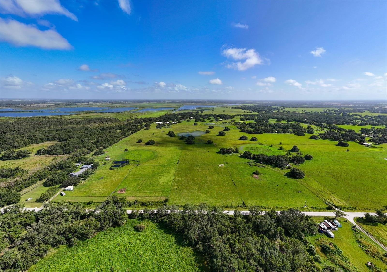 Discover 47 acres of pristine agricultural land nestled at the end of scenic River Road in Myakka City, just moments from the new Soleta Golf Club and within a 20 minute drive to the vibrant community of Lakewood Ranch. Currently the property has a cattle lease that may convey to the new owner and is a benefit for agricultural tax exemptions. The land is well-suited for any agricultural use while offering incredible potential for future development. With no HOA or deed restrictions, you have the freedom to build your dream homestead—whether that’s a custom farmhouse, a modern barndominium, or a fully equipped workshop. There are 2 existing wells and power already in place so construction costs will be eased.
The property allows for a primary residence and up to three accessory dwelling units (ADUs), or alternatively it can be subdivided to suit your plans. Mineral rights convey with the sale, and while the majority of the land lies in Flood Zone X (high & dry), there are three small areas of wetlands that provide a seasonal water source for livestock. This vacant land offers a rare opportunity to disconnect from the fast pace of city life without sacrificing access to everyday conveniences. The drive to the property winds through old Florida county roads, offering a peaceful and scenic entry that feels like stepping into a simpler time. Plus, with county plans to pave River Road in the future, accessibility and property value are poised to grow. Whether you're looking to establish a working ranch, a private country estate, or a long-term investment, this versatile property is a true blank canvas ready for your vision.