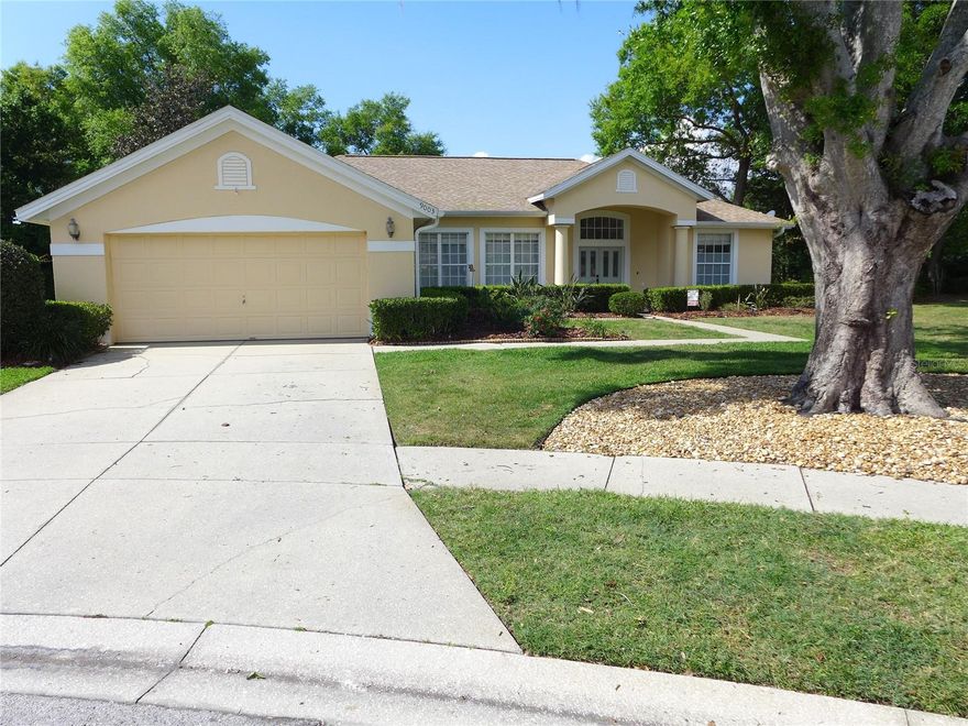 A secluded cul-de-sac family residence has just come onto the market. This lovely 3 bed 2 bath home just under 2,000 square feet has a beautiful private back yard with heated pool and covered lanai. The entry into the property takes you into a large formal living/dining room area with views and slider out onto the pool deck. The primary suite is privately situated and generously sized, complete with a walk-in closet and an en-suite bath featuring granite countertops, dual vanities, a soaking tub, and a separate glass-enclosed shower. Two additional bedrooms are located on the opposite side of the home with a full bath between them, providing excellent guest privacy. The open plan kitchen/nook/family room area gives a spacious feel with plenty of room to relax and provides the perfect setting for entertaining and family gatherings. The kitchen offers generous cabinetry, and a casual eat-in nook overlooking the family room.The utility room with new washer/dryer (2025) has a sink, ideal for cleaning off the golf clubs. The large 2 car garage has boarded out loft access ideal for storage.
Optional Country Club membership offers access to an 18-hole championship golf course with practice facilities, tennis and pickleball courts, a swimming pool, clubhouse amenities, dining at Beacon 19 Bar & Grill, and a full calendar of social events. Sidewalk-lined streets, mature landscaping, and a welcoming community atmosphere complete the setting. Just minutes from historic downtown Mount Dora’s shops, dining, festivals, and marina—and less than an hour to Orlando International Airport—this home delivers the best of golf-forward living with small-town charm.
Book an appointment to view today, this beauty won’t last long!