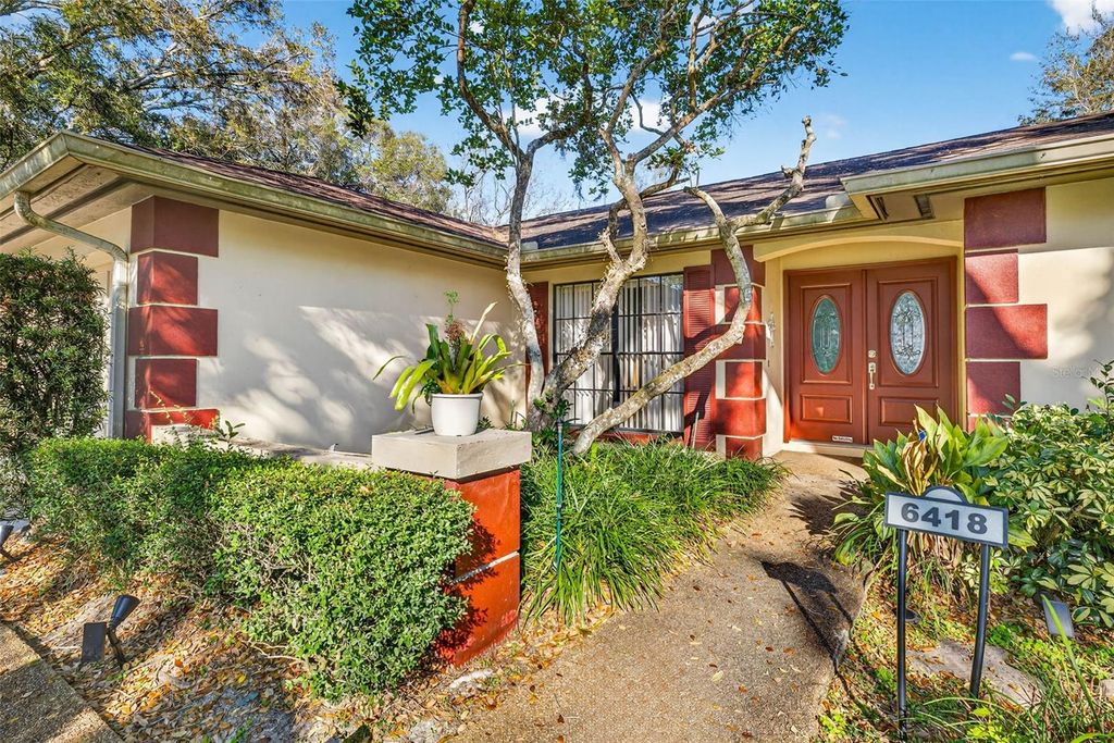 Photo of 6418 Jacqueline Arbor Drive, Temple Terrace, FL 33617 (MLS # TB8478050)