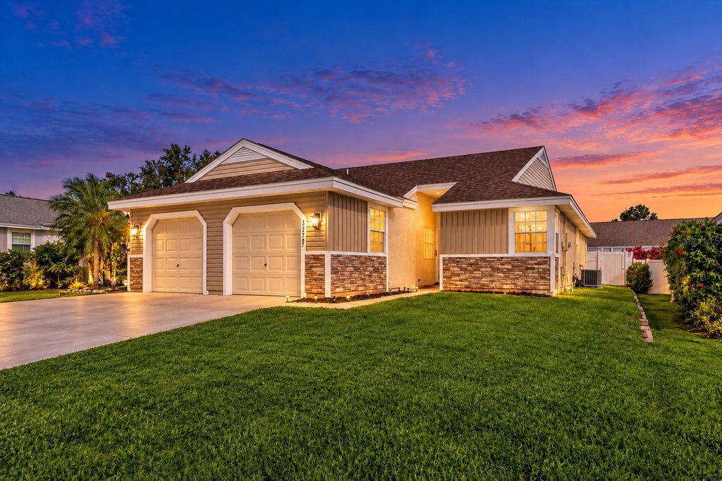 Photo of 3277 Hibiscus Drive, Palm Harbor, FL 34684 (MLS # TB8563304)