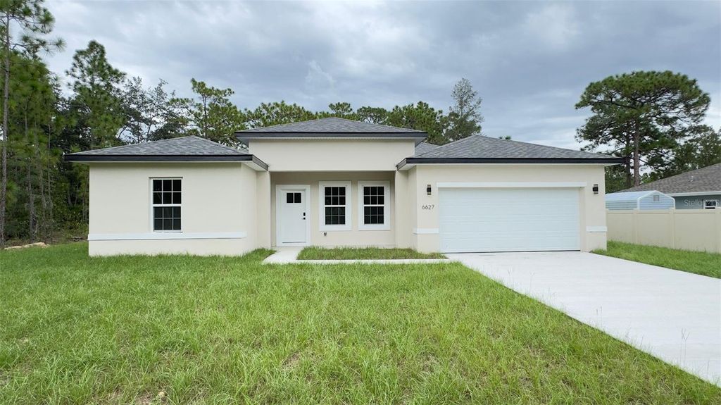 Photo of 6627 N Huntington Terrace, Citrus Springs, FL 34434 (MLS # O6343706)