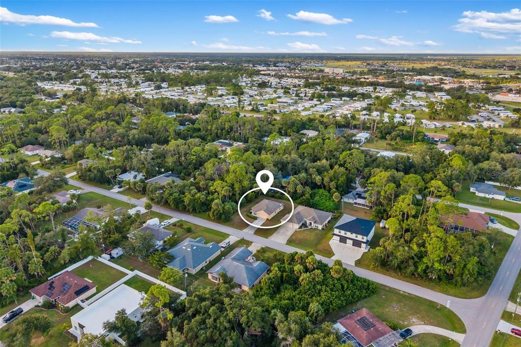Photo of 13558 Goodrich Avenue, Port Charlotte, FL 33953 (MLS # A4666371)