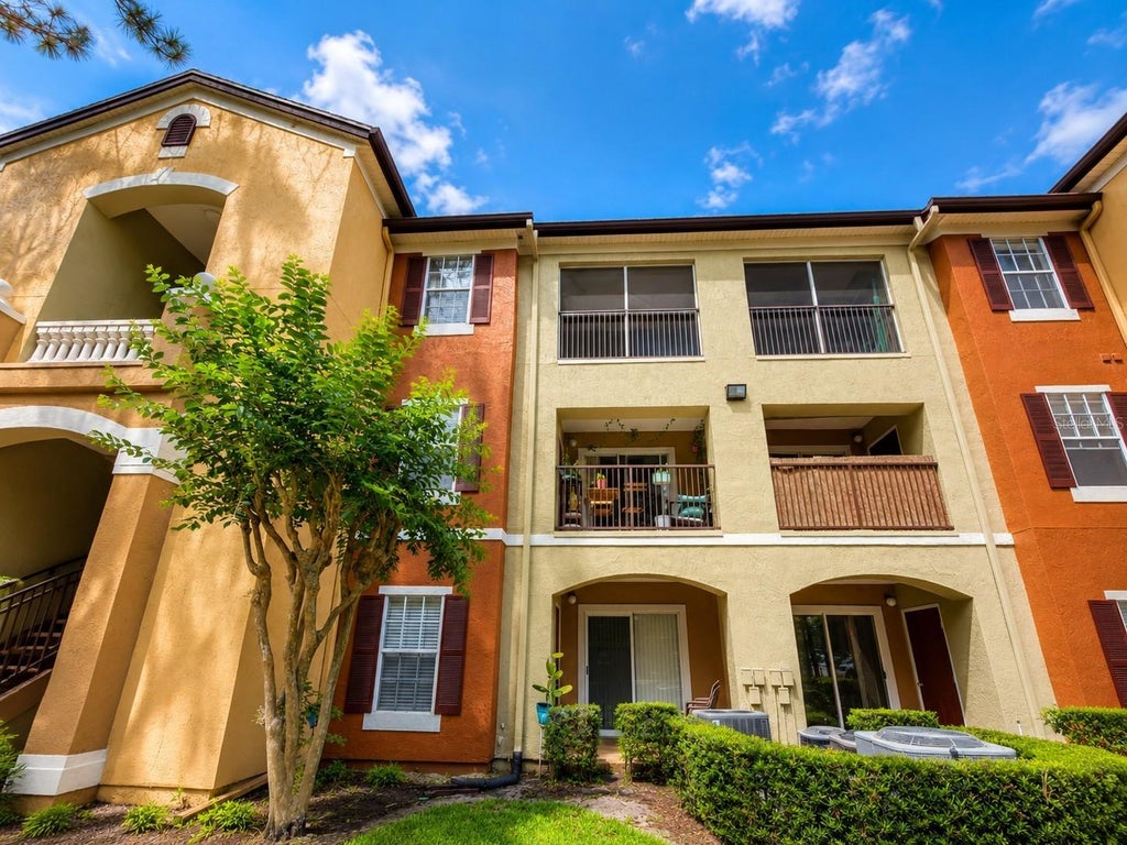 Photo of 802 Crest Pines Drive #836, Orlando, FL 32828 (MLS # S5151403)
