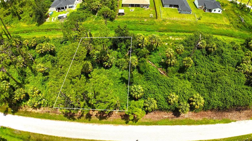 Build your Southwest Florida home in the best place in live – North Port, Florida.  This lot is in a developing area near the North Port Estates and not far from the Myakkahatchee Environmental Paerk and the Legacy Trail..  New homes are being built in this rural location but an easy drive to all the commerce, schools, shopping, restaurants via Toledo Blade Blvd.  Outdoor enthusiasts will enjoy the North Port Aquatic Center and check out the Morgan Family Community Center as well as catching a Spring Training game of the Atlanta Braves at CoolToday Park.  Fishing, boating, hiking and Gulf beaches are year round enjoyment in Southwest Florida.  Builders are available to help you design your Florida custom home.