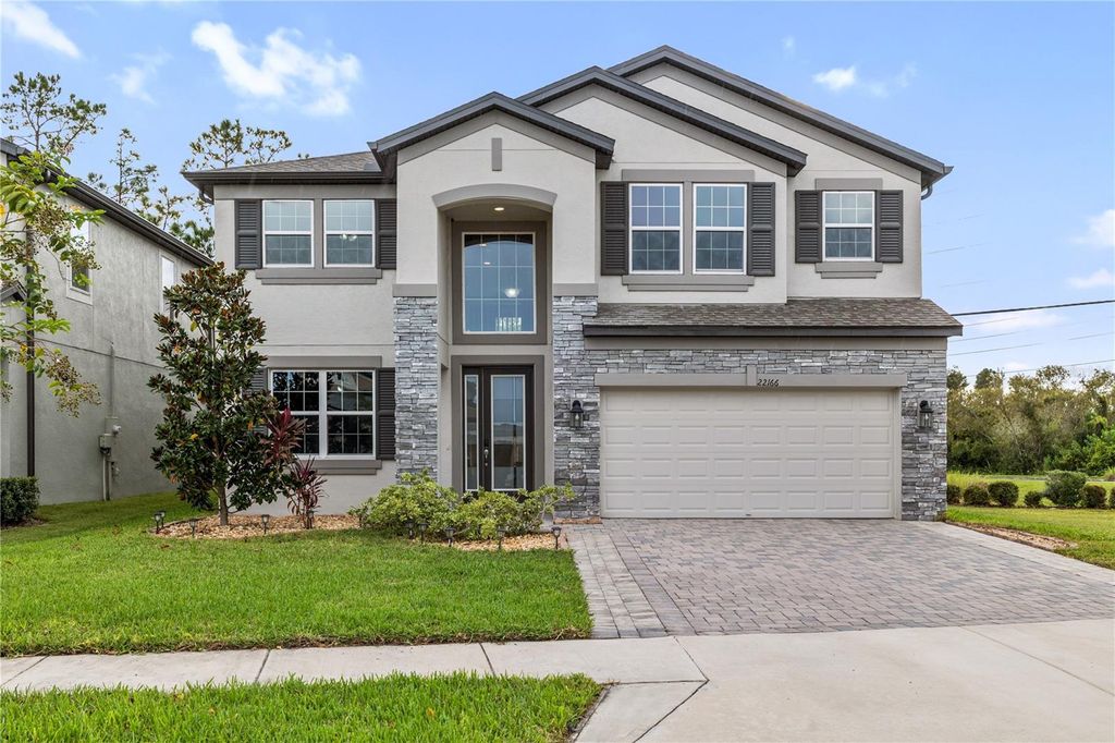 Photo of 22166 Woodmen Hall Drive, Land O Lakes, FL 34639 (MLS # TB8430760)