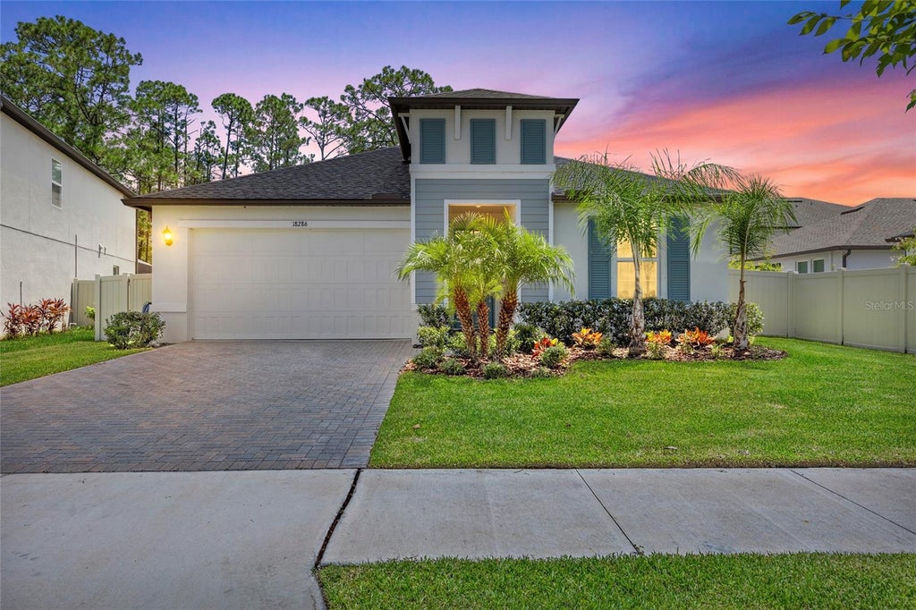 Photo of 18286 Serene Lake Loop, Lutz, FL 33548 (MLS # TB8545188)