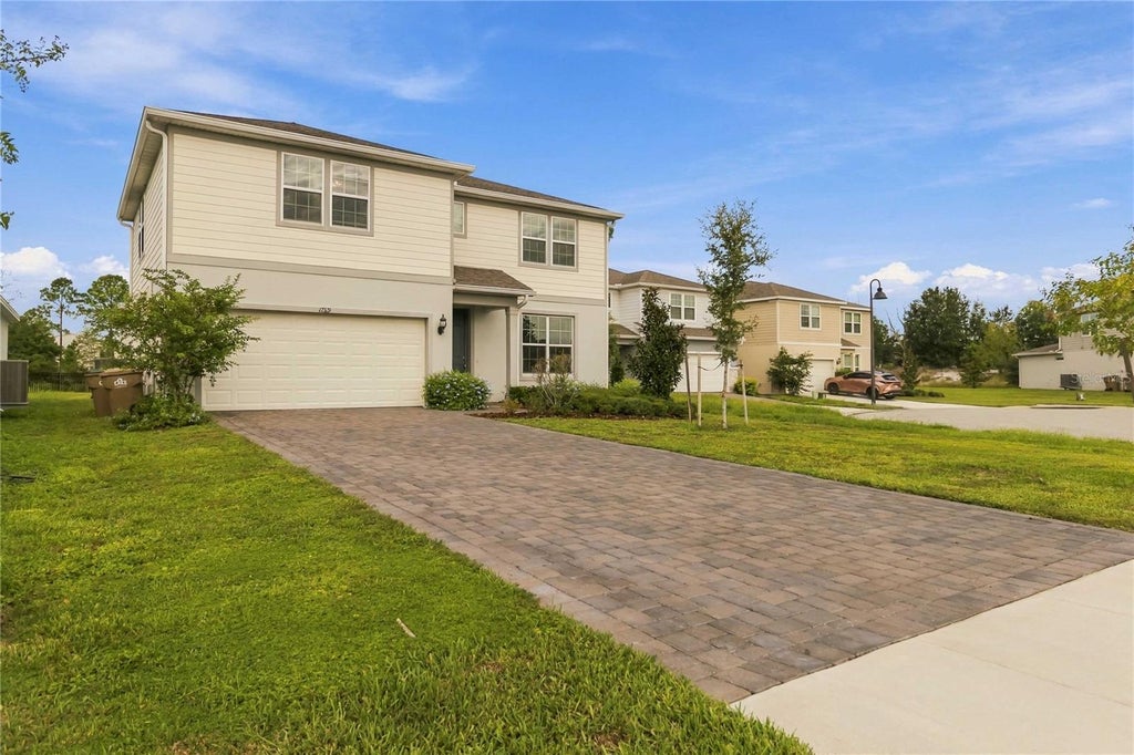 Photo of 17319 Million Lakes Court, Clermont, FL 34714 (MLS # O6438289)