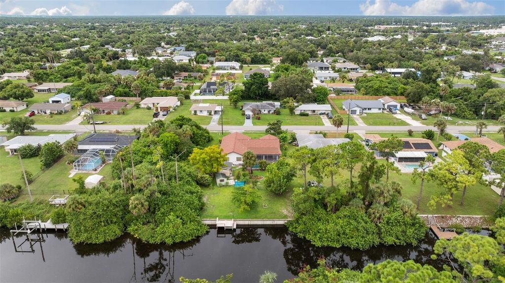 Photo of 2080 Pellam Boulevard, Port Charlotte, FL 33948 (MLS # A4664478)