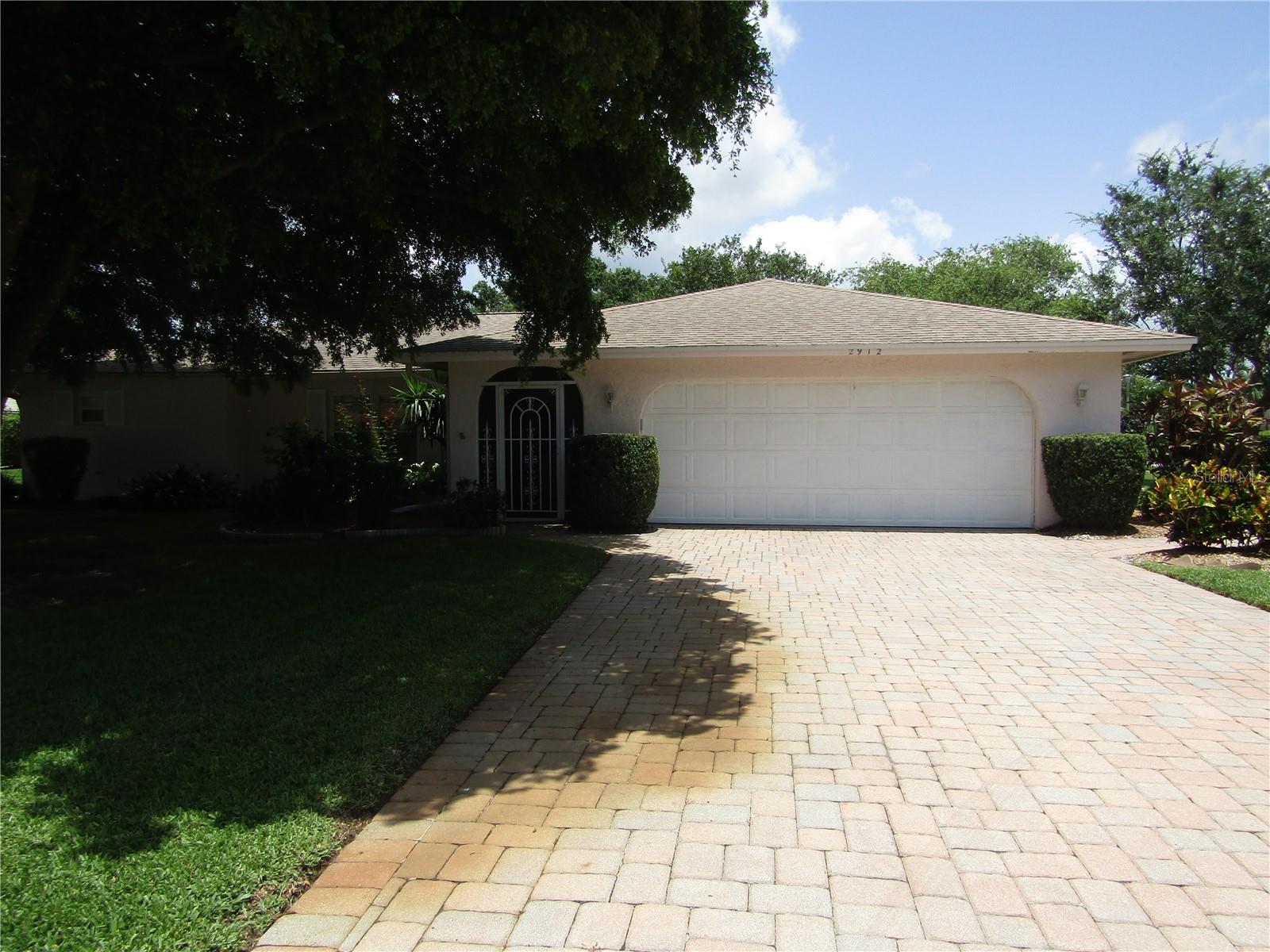 This spacious 2-bedroom 2 bath single family home is move-in ready. Located in the "Heart of the Meadows", it's close to everything, shopping, banking, the beaches, UTC Mall and Benderson Rowing Park. Tiled throughout for easy care living with lots of closet space for storing your possessions. The beautiful, updated kitchen boasts solid wood cabinets, stainless steel appliances and quartz counter. The glass enclosed lanai features a pass thru window from the kitchen and is a perfect space for entertaining guests. The baths have been graciously updated - the master bath features a walk-in shower and guest bath has tub with shower. The oversized 2 car garage has plenty of space for storing those bicycles that you will enjoy riding on through the tranquil setting of this golf community. Owner provides lawn care and pest control. the owner will allow a small pet with deposit and approval - this is a NO Smoking property.
