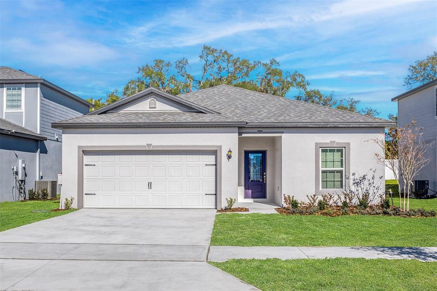 Under Construction. Welcome to the Amalie model in the charming brand-new Tula Parc community of Astatula! This thoughtfully designed 3-bedroom, 2-bathroom home offers a smart layout that provides both privacy and convenience for families and guests alike.

At the front of the home, two spacious bedrooms are situated around a full bathroom, creating an ideal space for visitors or family members. A separate laundry room, directly connected to the oversized two-car garage, adds practicality and storage.

The heart of the home is the expansive family room, perfect for gathering and entertaining. The kitchen is a chef’s delight, featuring modern appliances, granite countertops, and plenty of cabinetry. A separate dining area offers the perfect setting for meals and celebrations.

The private master suite, tucked away at the rear of the home, features a large window that welcomes natural light, a generous walk-in closet, and an en-suite bathroom with ample vanity space and additional shelving for organization.

Outside, enjoy the benefits of living in Tula Parc, with access to a community gazebo and playground. Plus, the home is just minutes from Little Lake Harris, offering opportunities for boating, fishing, and kayaking. Nature lovers will also appreciate the nearby parks, golf courses, and scenic outdoor spaces, while Orlando’s top attractions, shopping, and dining are just a short drive away.

Don’t miss the opportunity to make this beautiful Amalie model your new home—schedule a tour today!