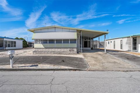 Photo of 12119 Bonanza Drive, Hudson, FL 34667 (MLS # TB8460553)