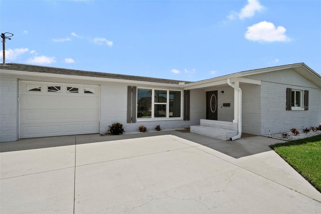 Photo of 12700 2nd Isle, Hudson, FL 34667 (MLS # TB8422660)