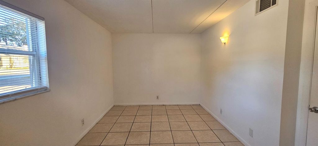 Photo of 302 S Spring Garden Avenue #C01, Deland, FL 32720 (MLS # O6394216)
