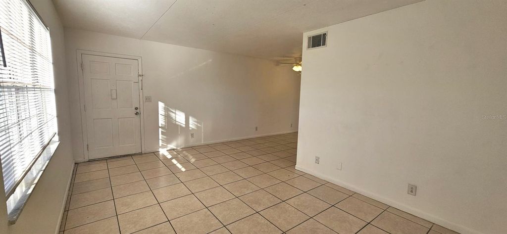 Photo of 302 S Spring Garden Avenue #C01, Deland, FL 32720 (MLS # O6394216)
