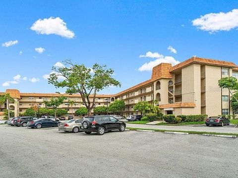 Photo of 5961 N Falls Circle Drive #411, Lauderhill, FL 33319 (MLS # TB8465217)