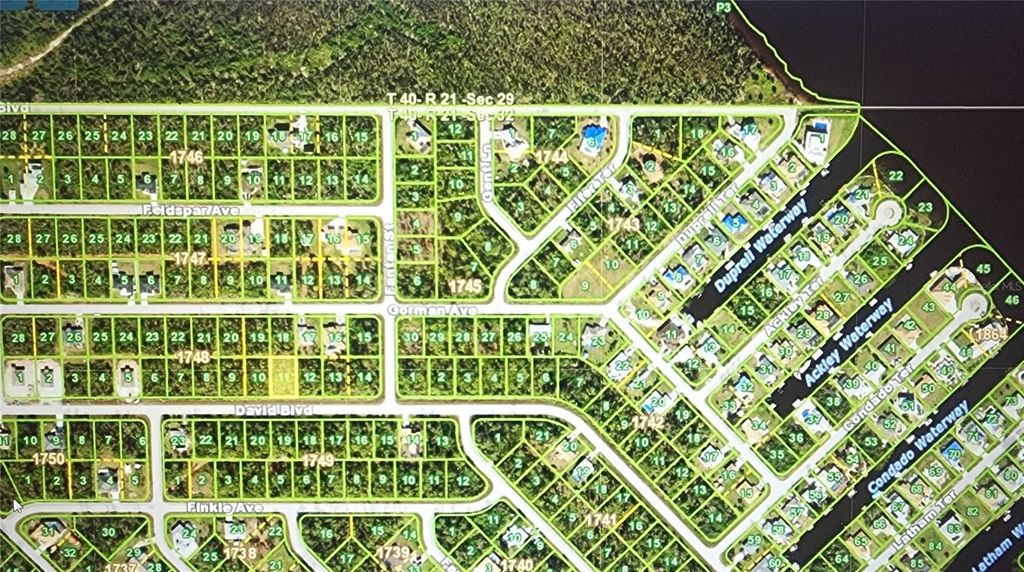 Photo of 5931 David Boulevard, Port Charlotte, FL 33981 (MLS # C7521810)