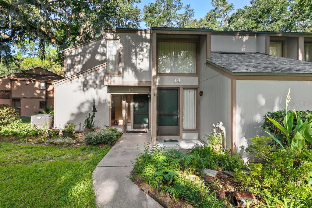 Photo of 13 Mid Oaks Circle #13, Palm Coast, FL 32137 (MLS # FC320913)