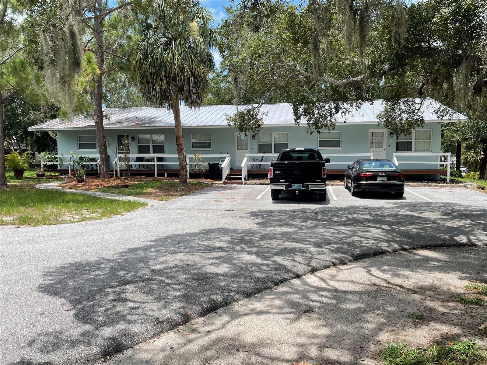 Great Ozona location, close to the Pinellas Trail, beautiful beaches, local restaurants. Apartment sits high and dry, no flooding with recent hurricane. Porcelain tile floors, full size washer and dryer inside. Apartment is an end unit. Eating space in kitchen, unit overlooks serene park like setting with trees and green space. New AC installed. Sit on the front porch and relax, enjoy the tranquil Ozona charm. Dedicated parking space, quiet and peaceful. Close to the Pinellas Trail, Ozona restaurants, post office, great Palm Harbor schools.