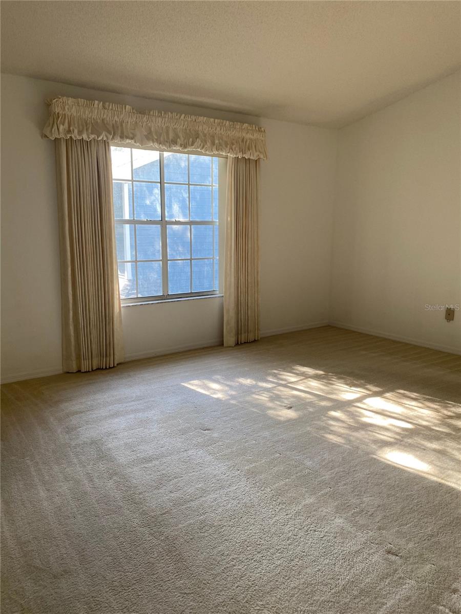 Photo of 3047 Oak Park Way #103, Orlando, FL 32822 (MLS # O6452280)