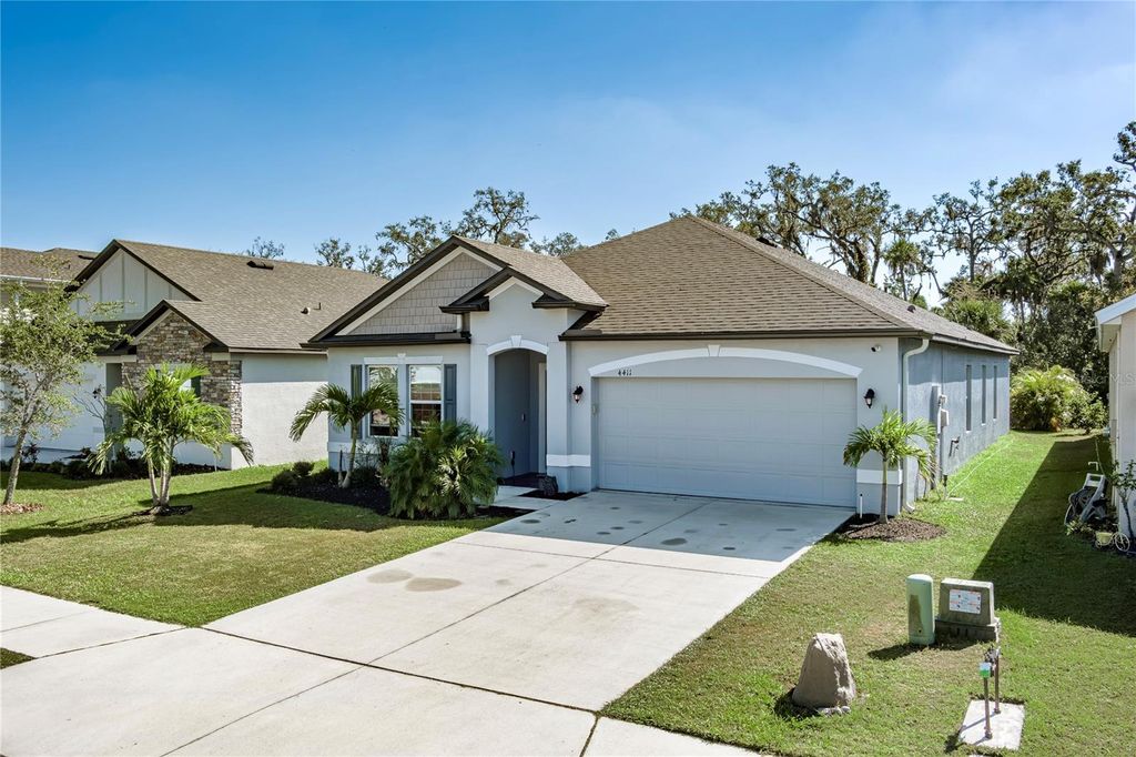 Photo of 4411 Reisswood Loop, Palmetto, FL 34221 (MLS # A4673051)