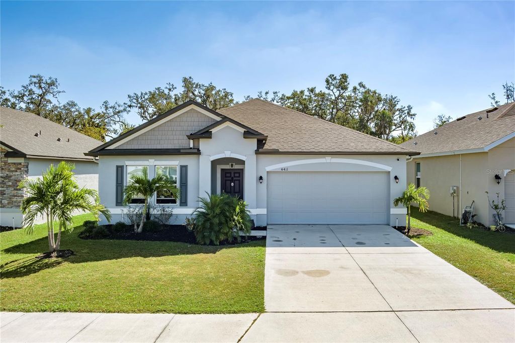 Photo of 4411 Reisswood Loop, Palmetto, FL 34221 (MLS # A4673051)