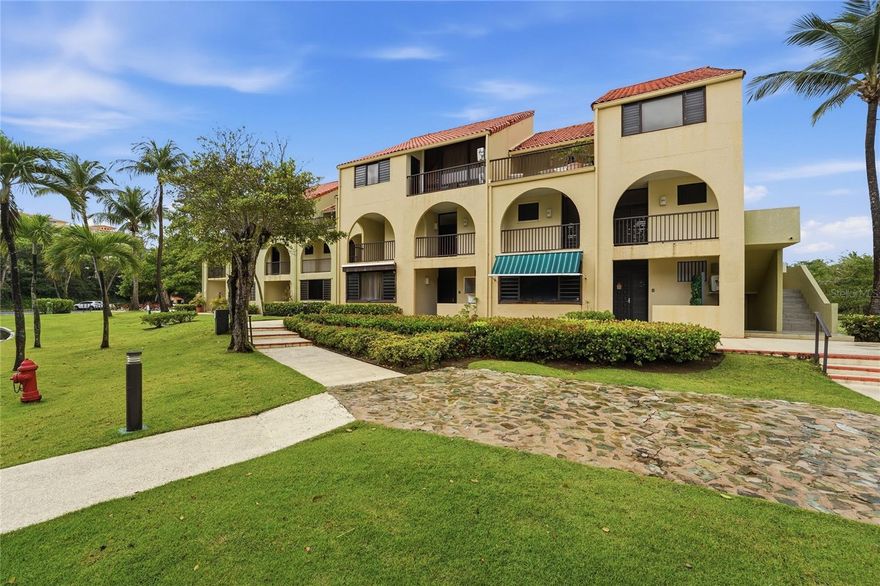 Welcome to Beach Village at Palmas del Mar -- one of Humacao's most sought-after resort communities on Puerto Rico's eastern coast.
This beautifully renovated 3-bedroom, 2-bathroom apartment offers 1,388 square feet of thoughtfully updated living space designed for comfort and an elevated island lifestyle. From the moment you walk in, the quality of the renovation is evident -- modern finishes throughout, central air conditioning, and a fully equipped kitchen with appliances included. Step out onto your private terrace and enjoy serene garden and golf course views -- a peaceful backdrop that makes every morning feel like a retreat. PROPERTY HIGHLIGHTS: - 2 Bedrooms / 2 Full Bathrooms - 1,388 Sq Ft | Fully Renovated - Private Terrace with Golf Course Views - Central Air Conditioning - Appliances Included (No Washer Dryer) - 2 Assigned Parking Spaces - Community Pool (Beach Village) - HOA Included COMMUNITY AMENITIES -- PALMAS DEL MAR: Palmas del Mar is one of Puerto Rico's premier master-planned communities, offering a resort lifestyle with world-class amenities just steps from your door: - Direct Beach Access -- just a 4-minute walk from the unit - Marina Access within the community - Golf Course (separate membership available) - Gated community with 24/7 security - Minutes from restaurants, retail, and recreational facilities LOCATION: Situated just 10 minutes from PR-53, Beach Village offers easy connectivity to the rest of the island while maintaining the tranquility of a private coastal enclave