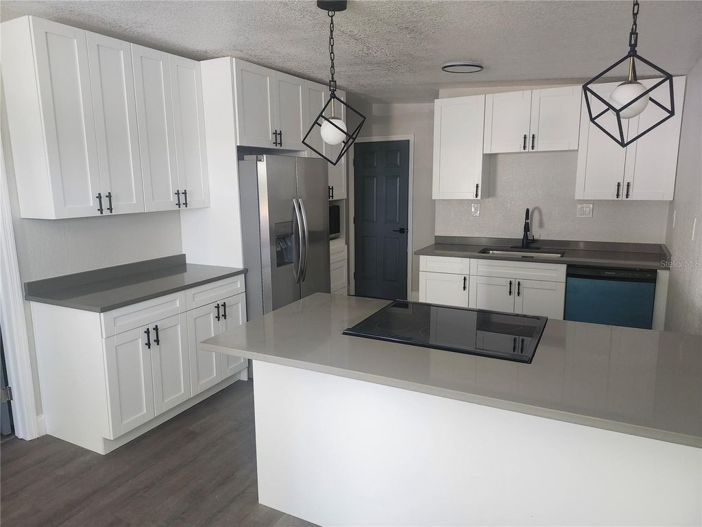 Photo of 825 Lincoln Avenue, Tarpon Springs, FL 34689 (MLS # W7874322)