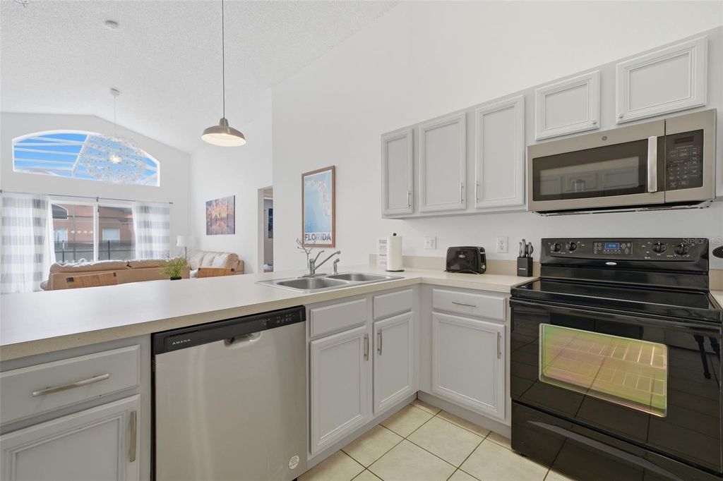 Photo of 155 Barefoot Beach Way, Kissimmee, FL 34746 (MLS # O6415529)