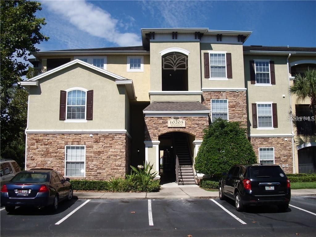 Photo of 10205 Courtney Palms Boulevard #203, Tampa, FL 33619 (MLS # TB8455075)