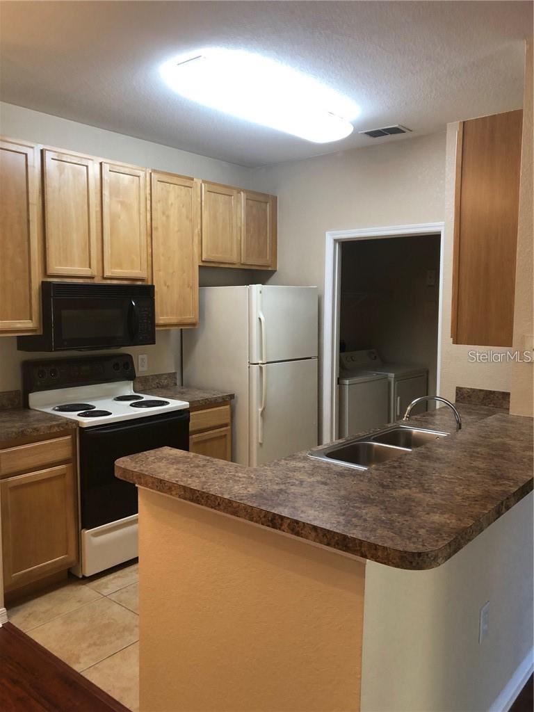 COURTNEY PALMS CONDO - Residential Lease