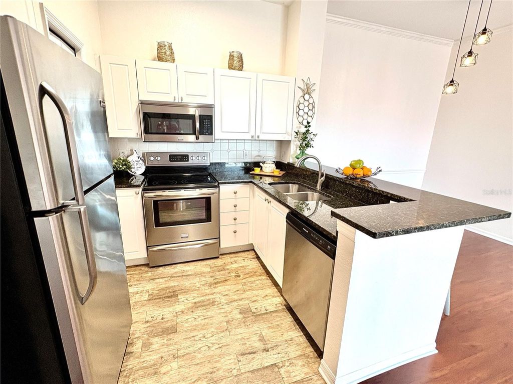 Photo of 18107 Peregrines Perch Place #6303, Lutz, FL 33558 (MLS # TB8493795)