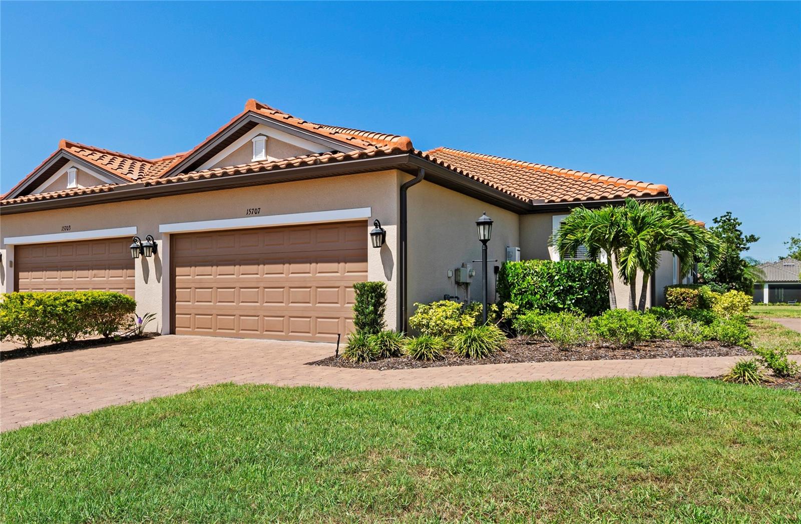 $19,000 Price Improvement! Don’t miss this exceptional opportunity to own a beautifully appointed home with a private pool and spa in the resort-style community of Esplanade at Lakewood Ranch. This exclusive residence offers open living spaces, elegant finishes, and a seamless blend of indoor-outdoor living. Enjoy world-class amenities- golf, tennis, fitness, dining, and more—within a vibrant, gated community. Now offered at a $20K reduced price, this home is a must-see for buyers seeking luxury and value in one of Lakewood Ranch’s most desirable neighborhoods.
Relax in your private pool and spa while soaking in serene lake views—a rare luxury no longer available in Esplanade's villa series. Enjoy an immersive entertainment experience in your spacious living room, with built-in surround sound speakers.
This unique villa represents a once-in-a-lifetime opportunity, as pools are no longer permitted in new villa constructions within the community. Embrace maintenance-free living complemented by full resort-style amenities: vibrant social events, excursions, golf, fitness facilities, wellness center, multiple pools, clubhouse, and dining at three exceptional on-site restaurants—Bahama Bar, Barrel Bistro, and Olive & Vine.
Don't miss your chance to secure this unparalleled piece of paradise!
The gourmet kitchen boasts stunning granite countertops, stylish cabinetry, premium stainless steel appliances, a convenient breakfast bar, and a contemporary tiled backsplash—perfect for daily meals and entertaining.
Relax in the luxurious master suite, featuring large windows offering tranquil outdoor vistas, plush carpeting, a spacious walk-in closet, and an inviting ensuite bath with dual vanities, quartz countertops, and an oversized walk-in glass shower.
Additional highlights include a charming formal dining area accented by an elegant chandelier, generous guest bedrooms each with walk-in closets, a versatile study/den area ideal for working from home or relaxing, and beautifully tiled flooring throughout the main living areas for easy maintenance.
Outside, the screened lanai, pool, and spa provide the ideal setting for soaking in the Florida sunshine or hosting gatherings with family and friends while enjoying beautiful lakefront views.
Esplanade community amenities include a resort-style pool, spa, fitness center, tennis and pickleball courts, restaurants, bar, walking trails, social events, and an activities director to keep you engaged. Conveniently located near local amenities, parks, and top-rated schools, this villa offers an exceptional blend of luxury, comfort, and style. Schedule your private viewing today and experience the unique charm of this Esplanade gem firsthand!