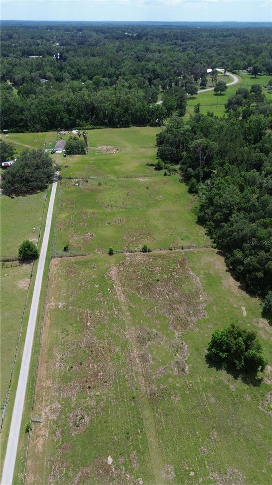 Over 6 acres of prime vacant land just minutes from Hwy 27. Ideal for investment, or building your dream estate. Enjoy peaceful surroundings with easy access to major routes, shopping, and amenities. Don't miss this opportunity!