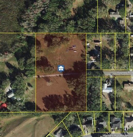 4-Acre Lot – Build Your Dream Home or Divide and Sell! Looking for space to build your dream home? This 4-acre residential lot gives you plenty of room in a peaceful, scenic setting—and it’s not in a flood zone, so you can build with confidence. Bring your own builder and design the custom home you’ve always wanted. Want to do more with the land? You’ve got options! This property can be split into separate parcels, giving you the flexibility to sell part of it or build multiple homes. Mobile homes are not permitted. Whether you're dreaming of a private homestead or looking for a smart investment opportunity, this lot is full of potential!