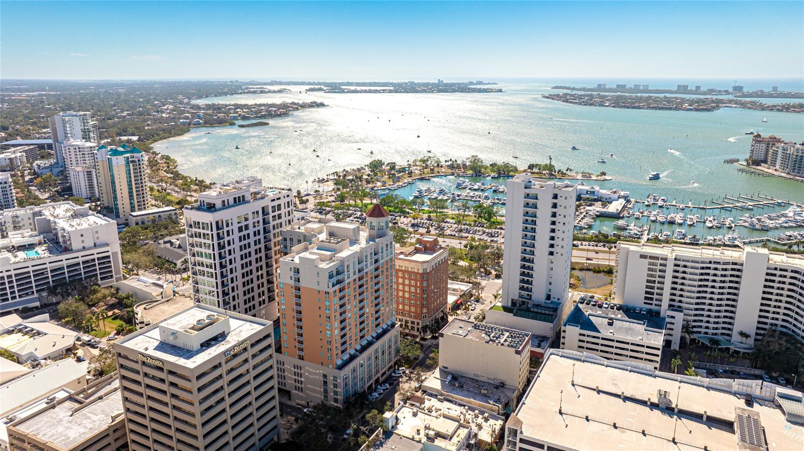 Welcome to luxury living in the heart of downtown Sarasota. This fully furnished 2-bedroom, 2-bath residence offers a split floor plan designed for privacy and comfort. Situated on the 15th floor, the home features expansive windows with sweeping views of downtown Sarasota, filling the space with natural light and an elevated sense of sophistication.
Inside, you’ll find a beautifully designed interior that is both stylish and pristine. The open living and dining area flows seamlessly, creating a warm yet modern atmosphere. The kitchen is well-appointed and functional, perfect for everyday living or entertaining. Both bedrooms are spacious retreats, each with their own bath, making this an ideal setup for guests or a home office.
Step outside your door to experience the very best of Sarasota where fine dining, boutique shopping, and cultural attractions are all just steps away. The Bayfront and Marina Jack’s are within easy walking distance, offering endless opportunities to enjoy the waterfront lifestyle.
As a resident, you’ll also enjoy resort-style amenities including a heated pool and spa, a state-of-the-art fitness center, library and sitting areas, and business and gathering rooms designed to enhance your lifestyle.
1350 Main is one of Sarasota’s most desirable downtown addresses, combining unparalleled location, stunning views, and luxurious amenities.